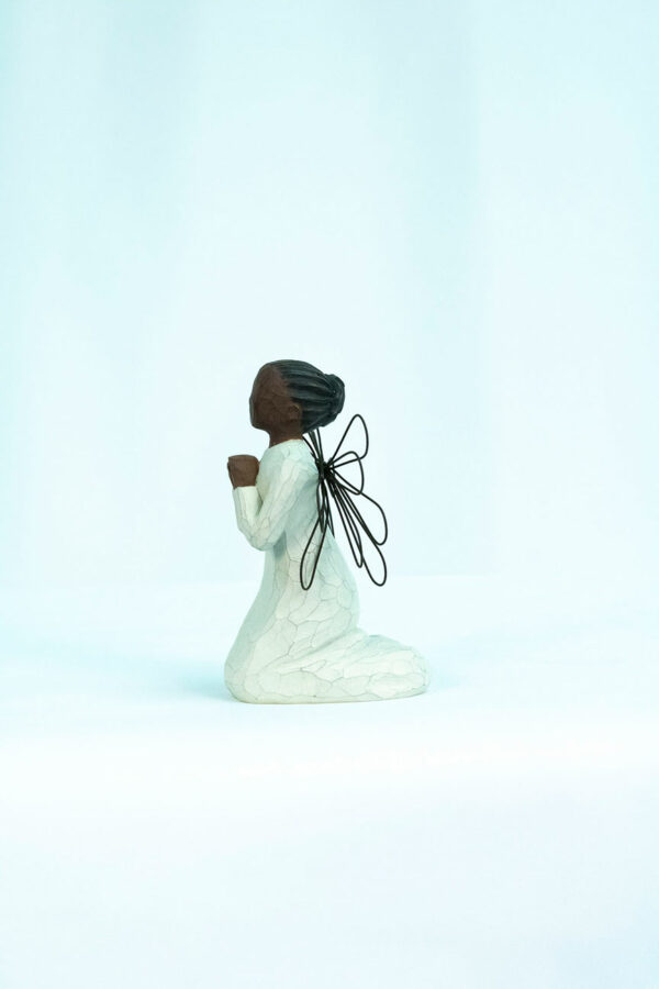 angel figurine with wire wings, praying hands, left