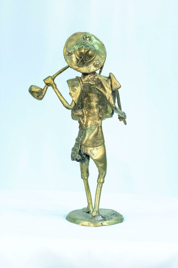 figurine, brass man with pipe, back