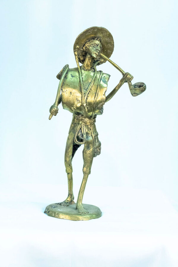 figurine, brass man with pipe, front