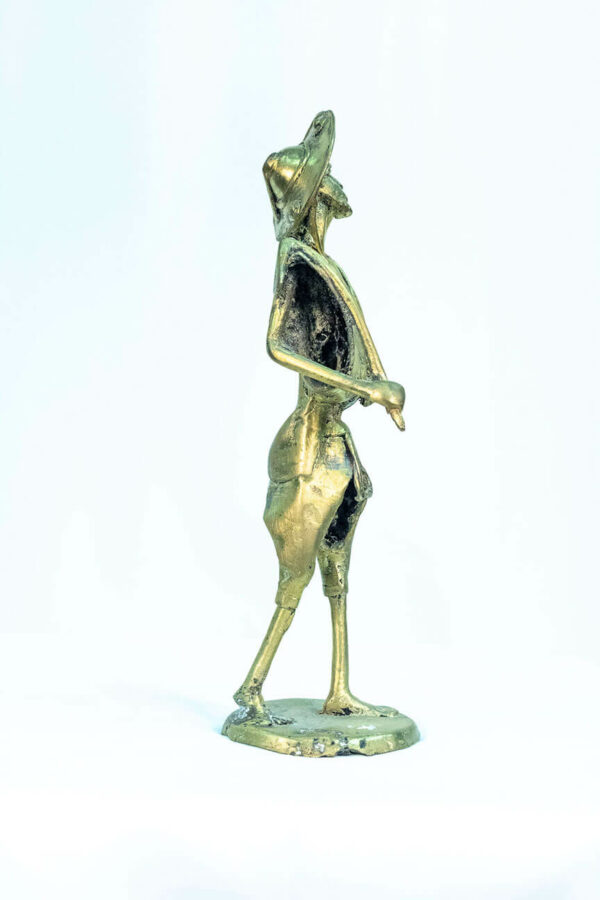 figurine, brass man with pipe, right