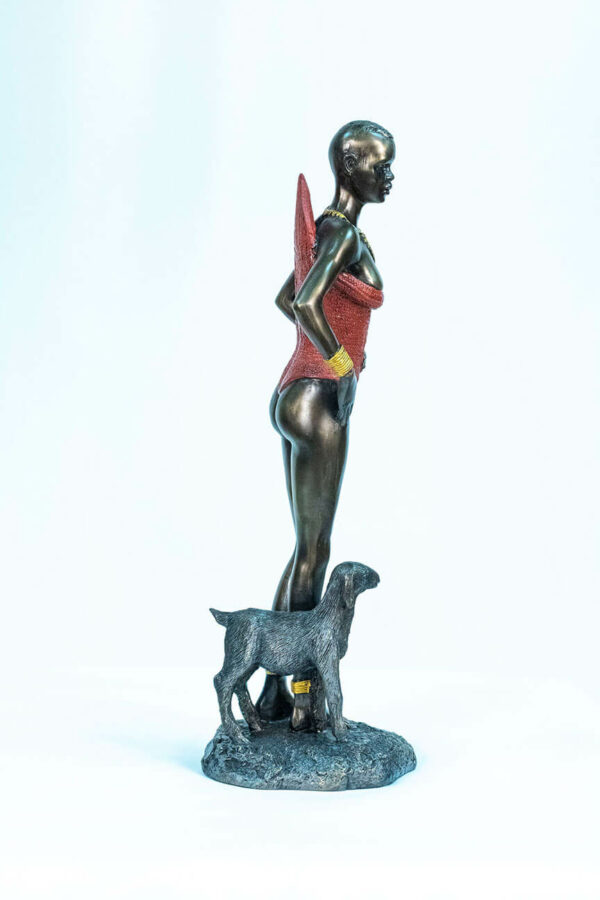 figurine, dinka lady with lamb, right