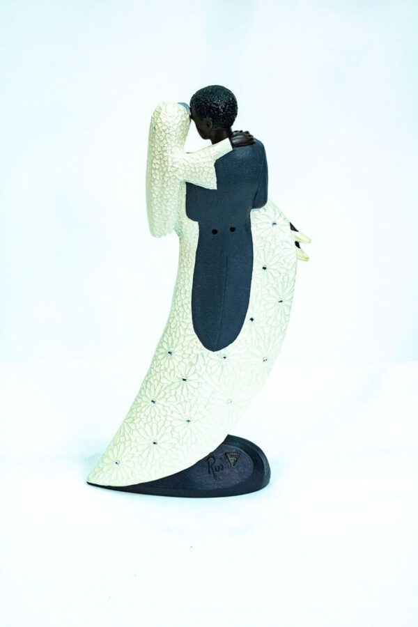 wedding couple figurine, groom holding bride, back