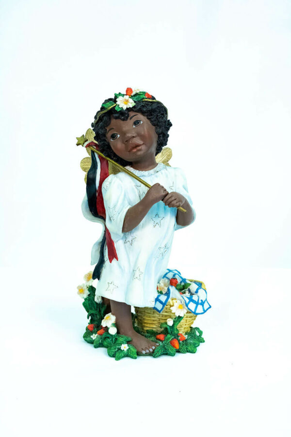 child angel figurine holding colorful flag, front view