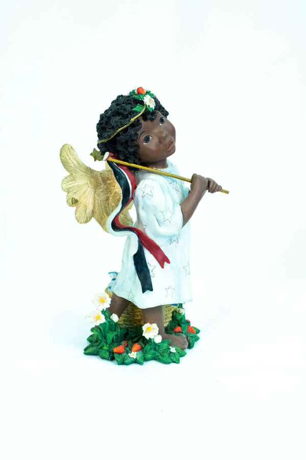 child angel figurine holding colorful flag, right view