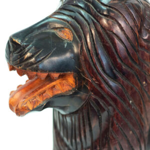 wood carving of lion, closeup