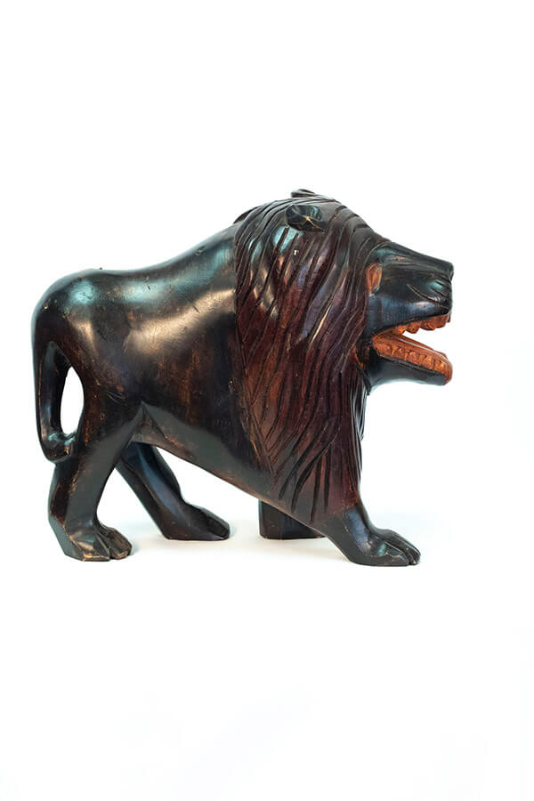 wood carving of lion, right