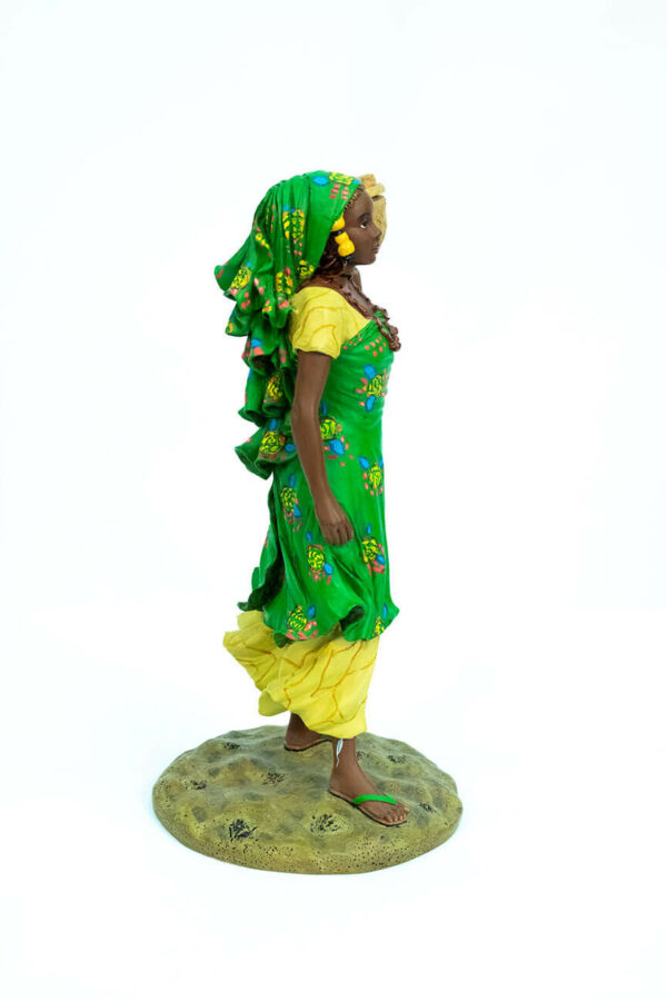 African figurine, Peul woman in green dress holding basket, right